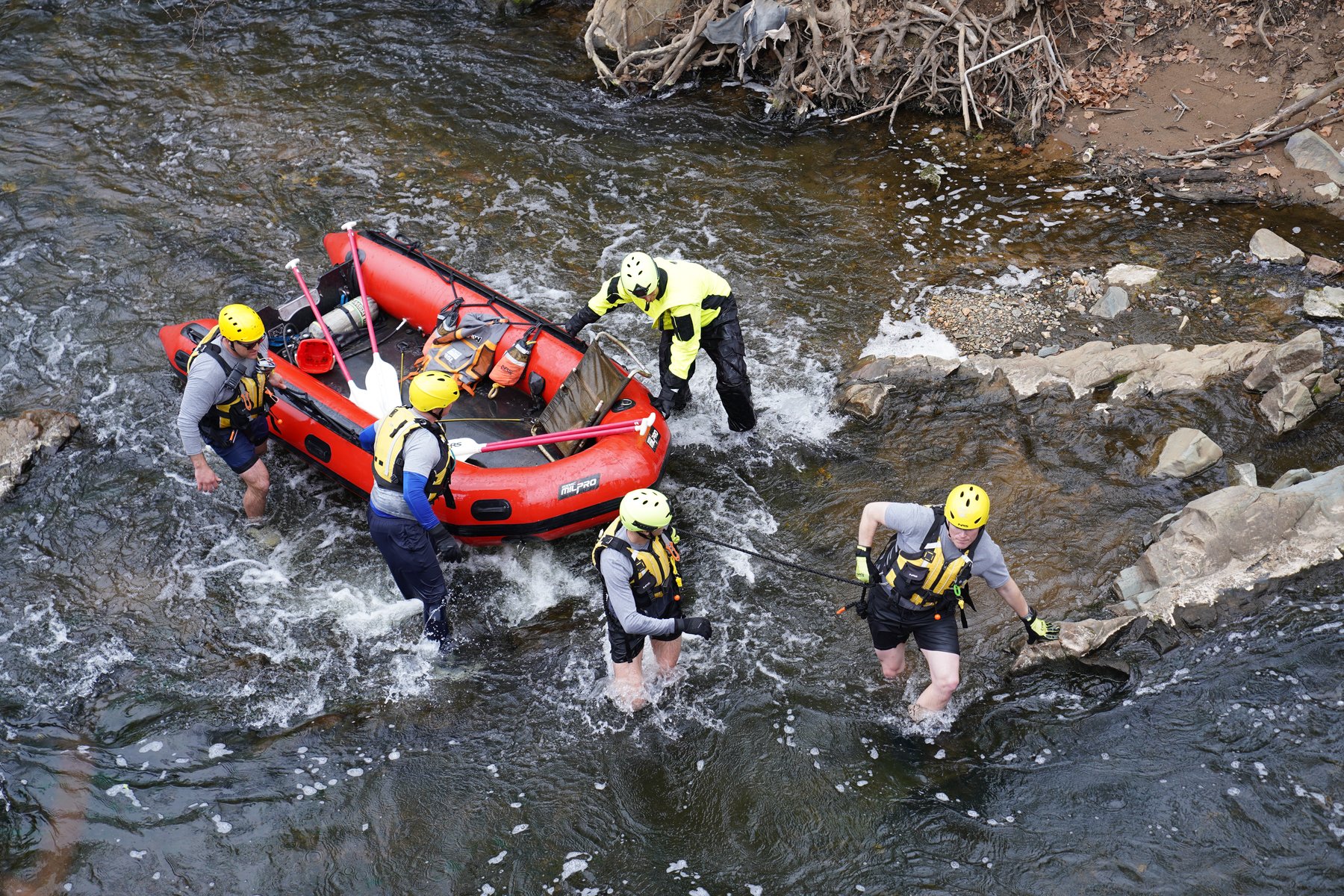 ACFR swift water rescue team navigating a river during training operations